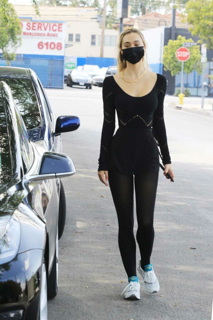 Alexis Ren in a Black Protective Mask