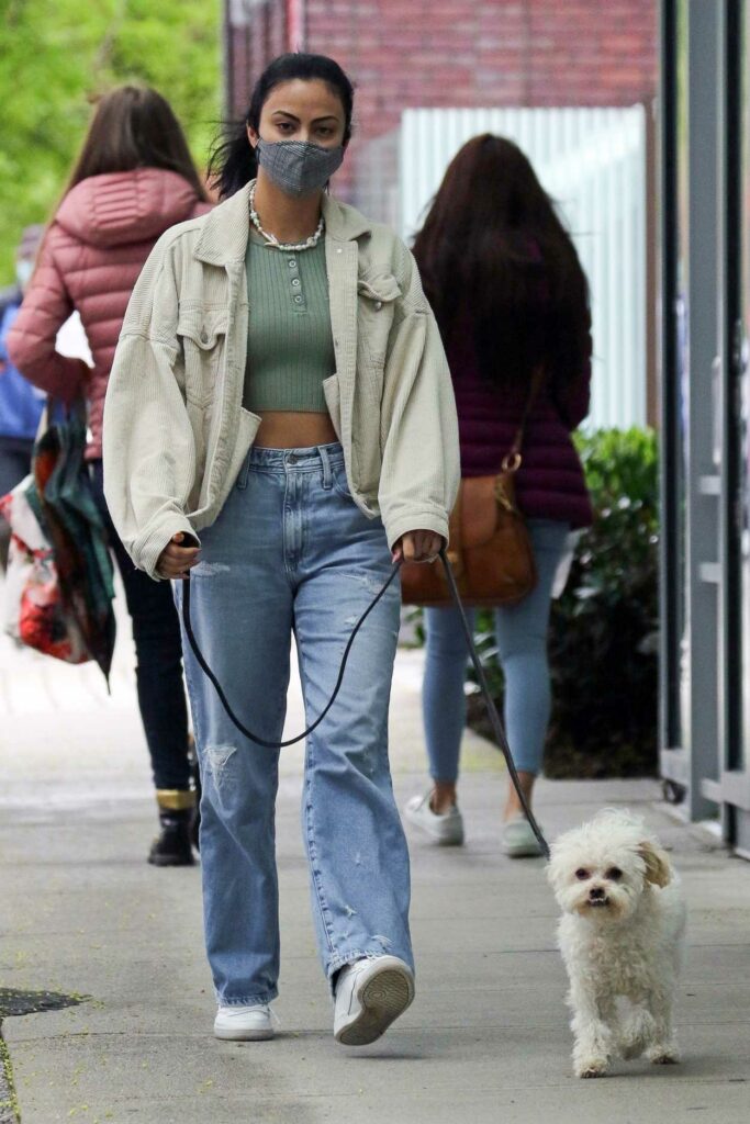 Camila Mendes in a Beige Jacket