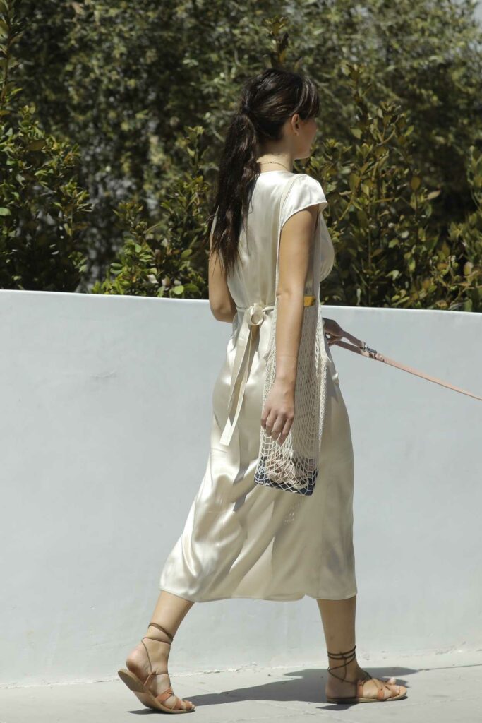 Camila Morrone in a Beige Dress