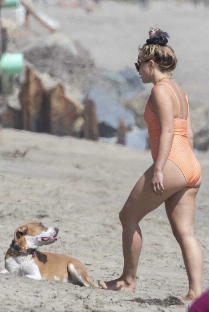 Florence Pugh in an Orange Swimsuit