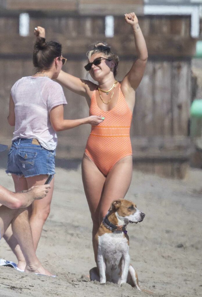 Florence Pugh in an Orange Swimsuit