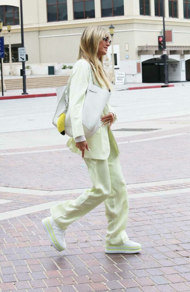 Heidi Klum in a White Sneakers