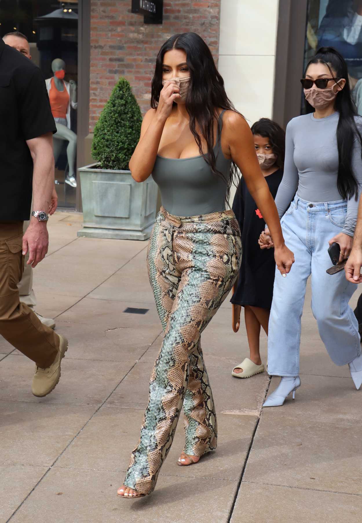 Kim Kardashian in a Grey Top Attends Her SKIMS Pop Up Shop at the Grove