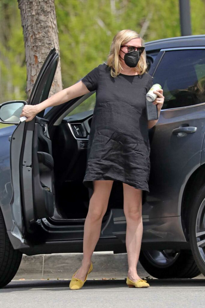 Kirsten Dunst in a Black Dress