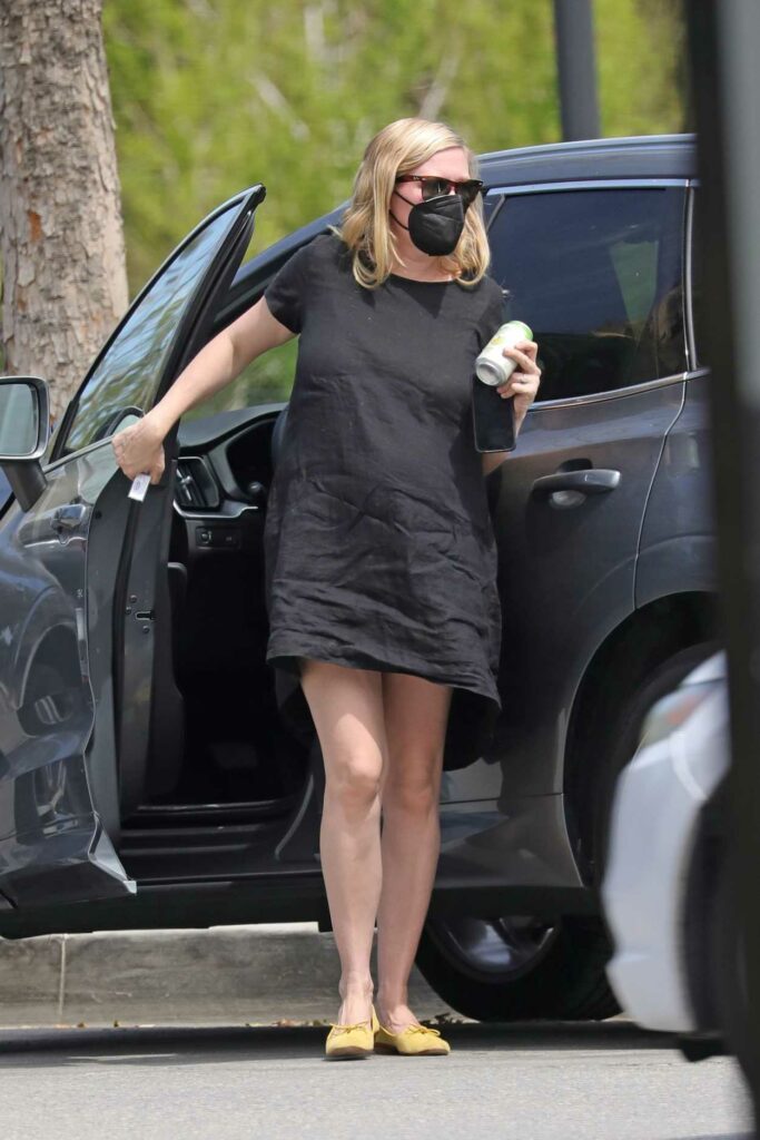 Kirsten Dunst in a Black Dress
