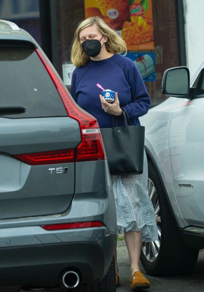 Kristen Dunst in a Blue Sweatshirt