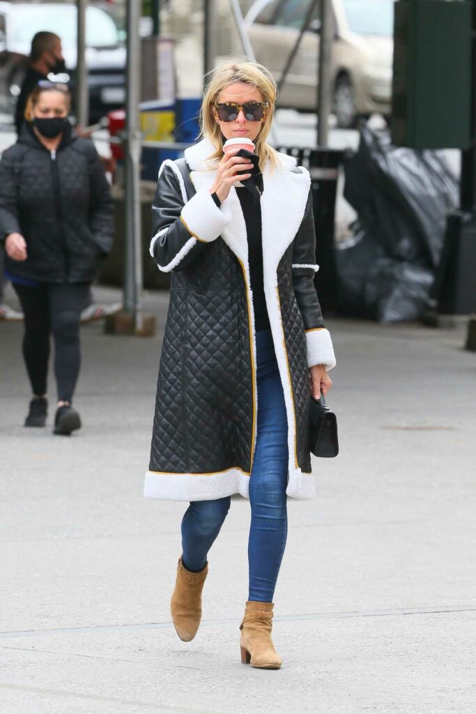 Nicky Hilton in a Black and White Sheepskin Coat