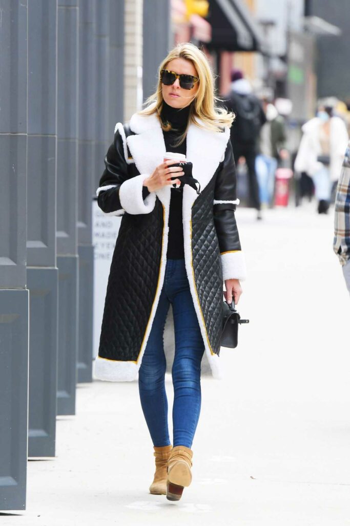 Nicky Hilton in a Black and White Sheepskin Coat