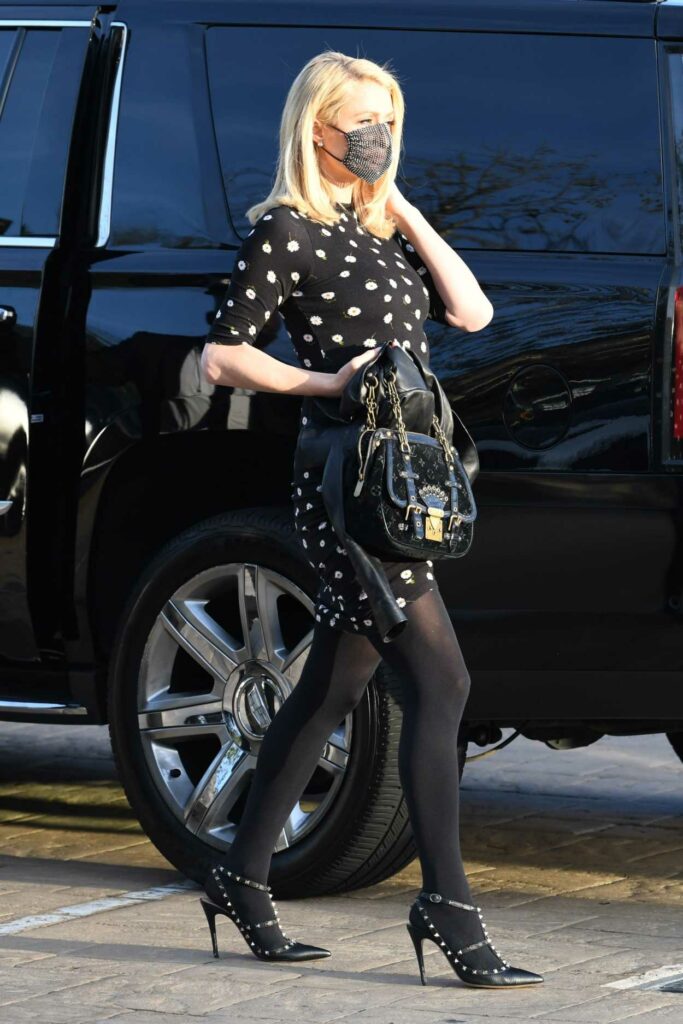Paris Hilton in a Black Floral Mini Dress
