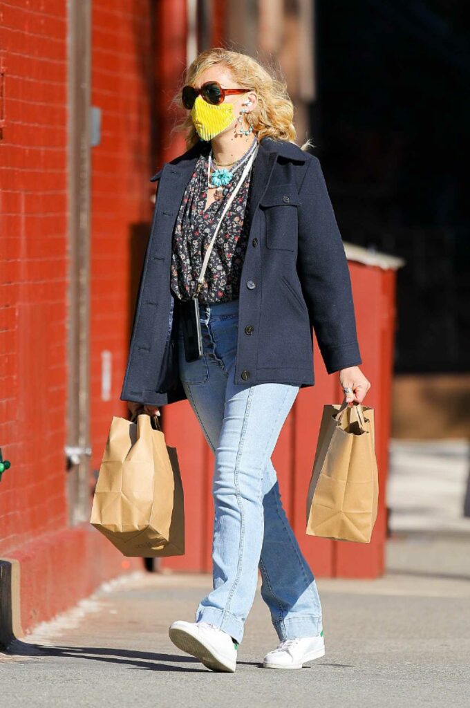 Busy Philipps in a Yellow Protective Mask