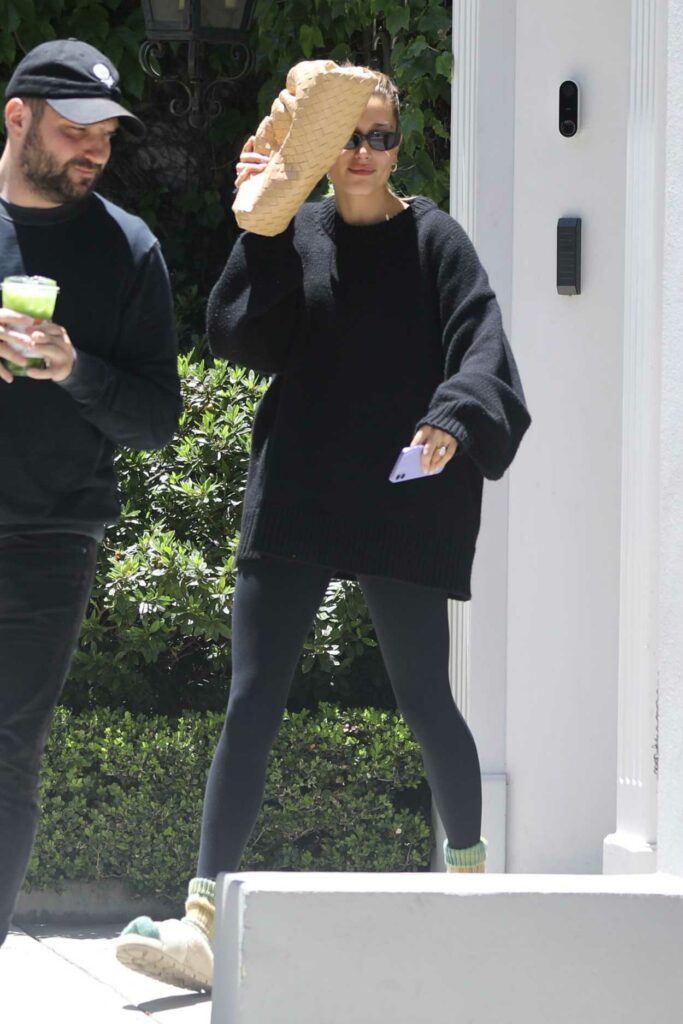 Hailey Bieber in a Black Oversized Sweater