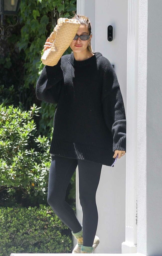 Hailey Bieber in a Black Oversized Sweater