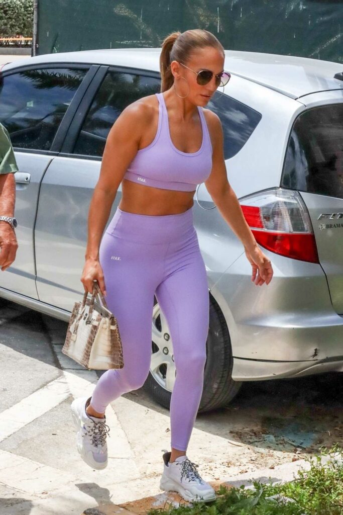 Jennifer Lopez in a Purple Workout Ensemble