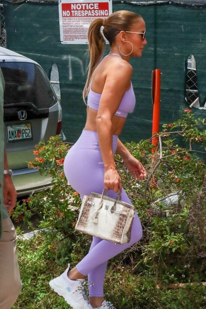 Jennifer Lopez in a Purple Workout Ensemble
