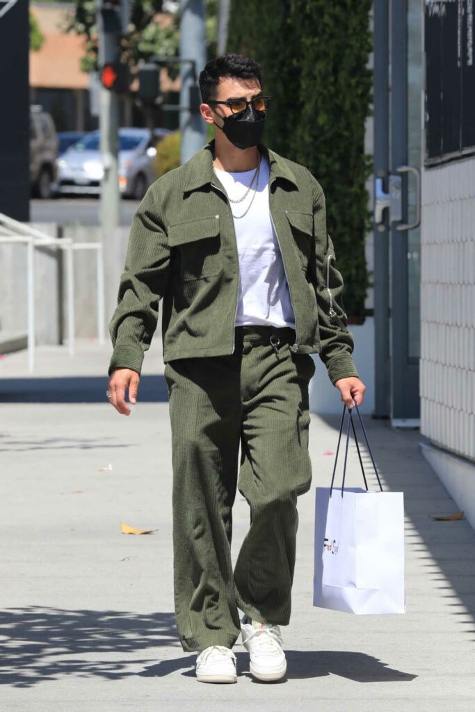 Joe Jonas in an Olive Suit