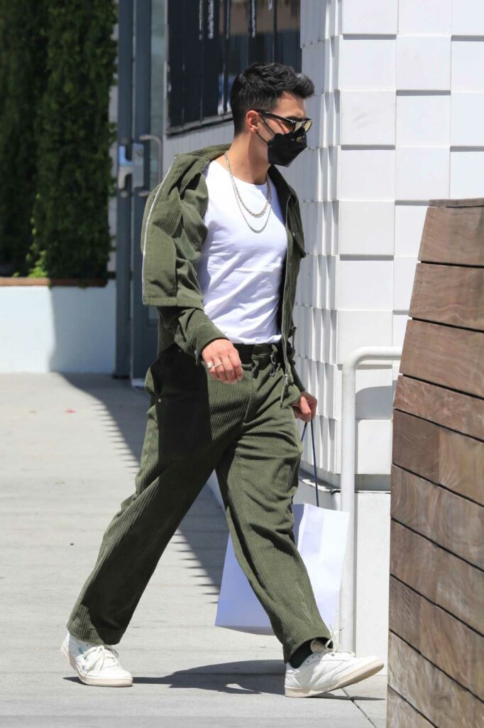 Joe Jonas in an Olive Suit