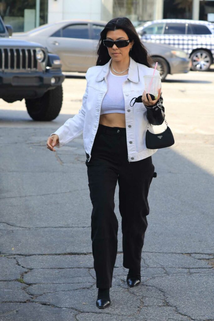 Kourtney Kardashian in a White Jacket