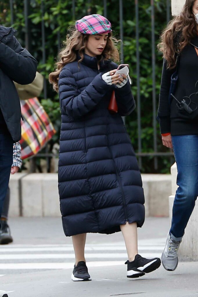 Lily Collins in a Black Puffer Coat
