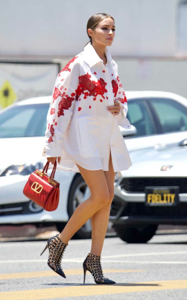 Olivia Culpo in a White Floral Print Shirt