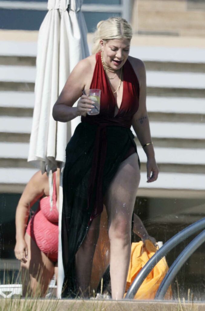 Tori Spelling in a Red Swimsuit