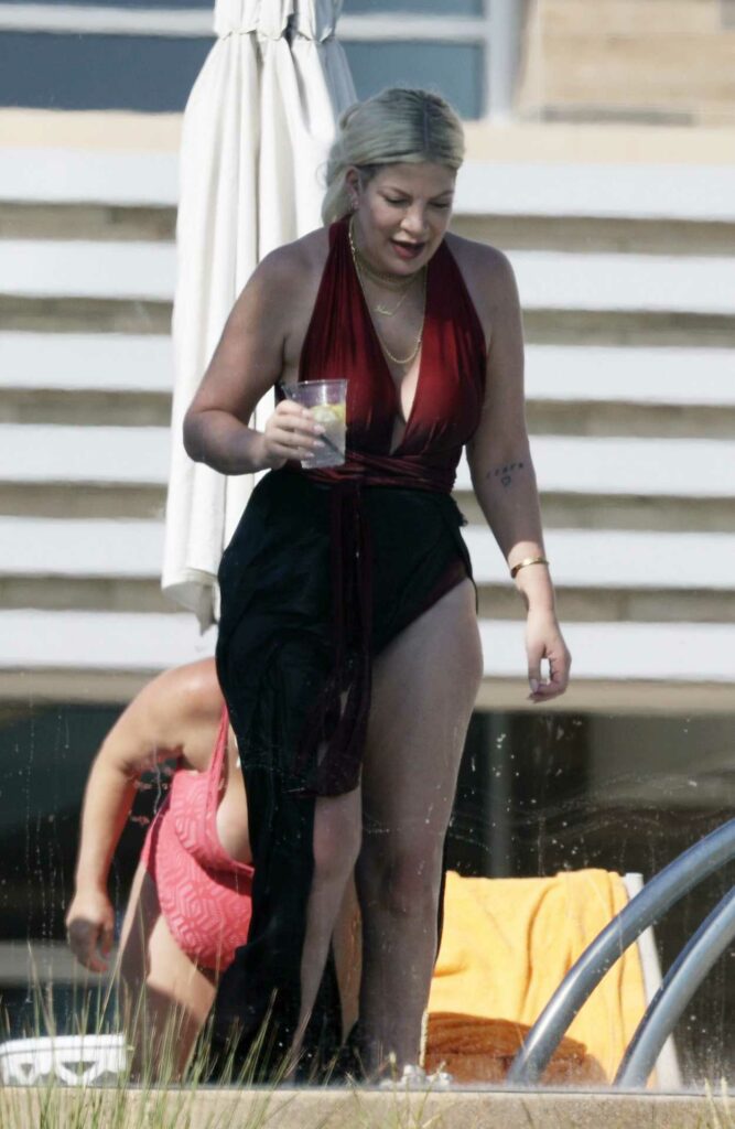 Tori Spelling in a Red Swimsuit