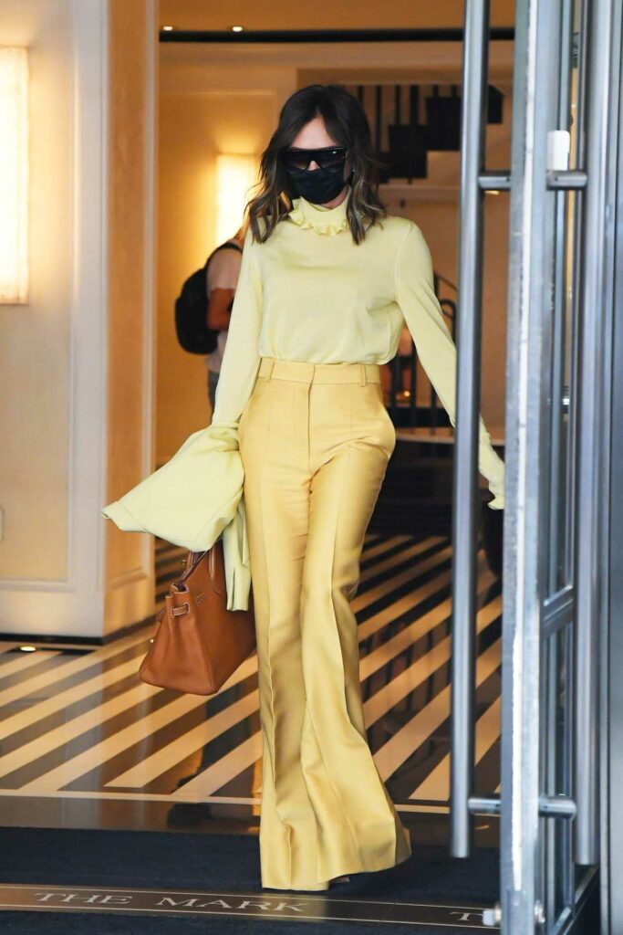 Victoria Beckham in a Yellow Outfit