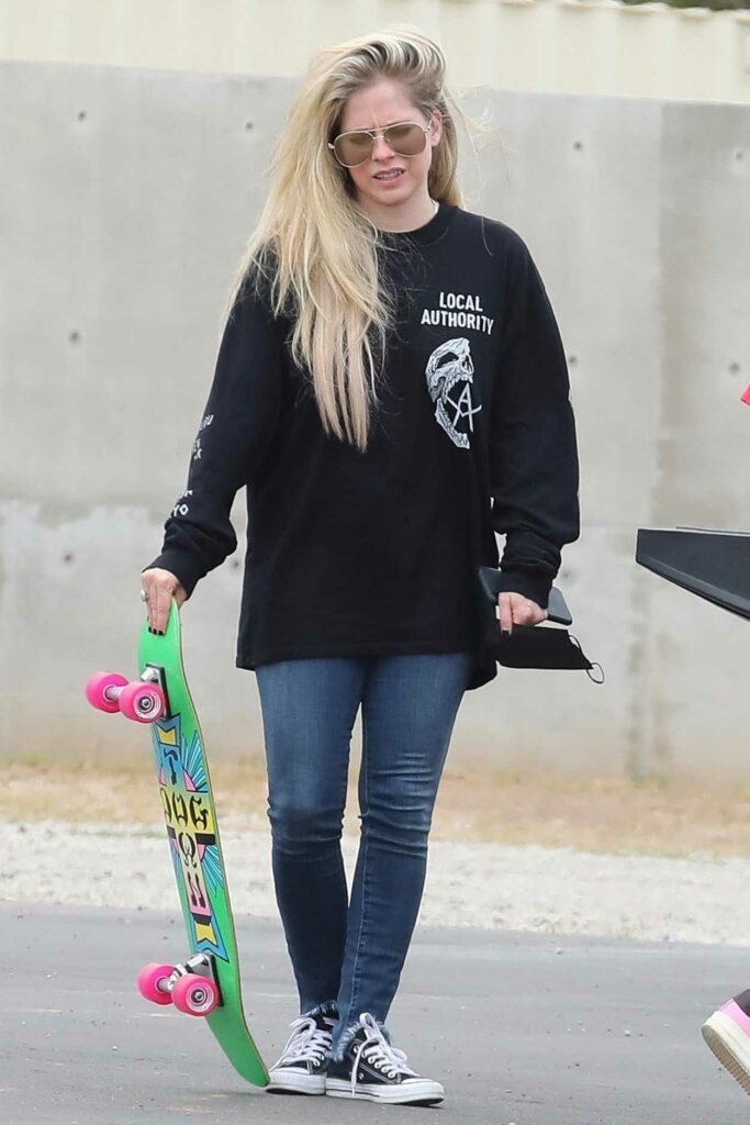 Avril Lavigne in a Black Sweatshirt