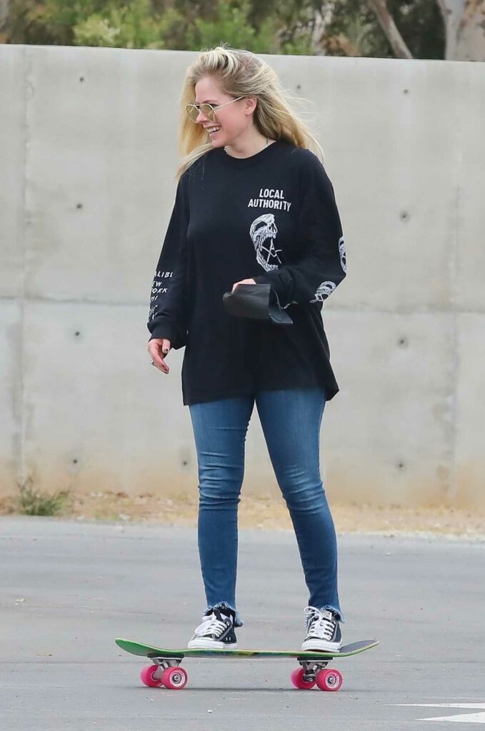 Avril Lavigne in a Black Sweatshirt