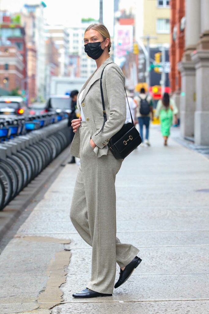 Karlie Kloss in a Grey Pantsuit