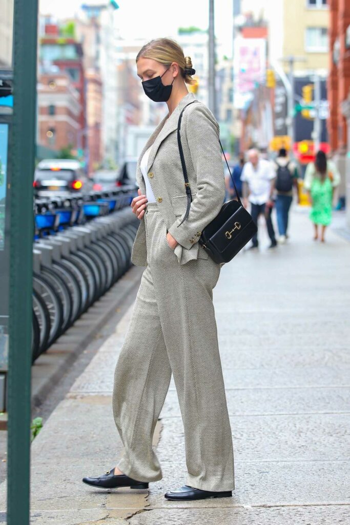 Karlie Kloss in a Grey Pantsuit