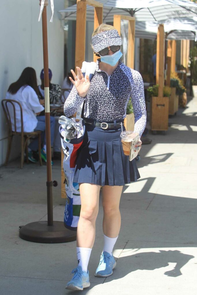 Kathryn Newton in a Blue Mini Skirt