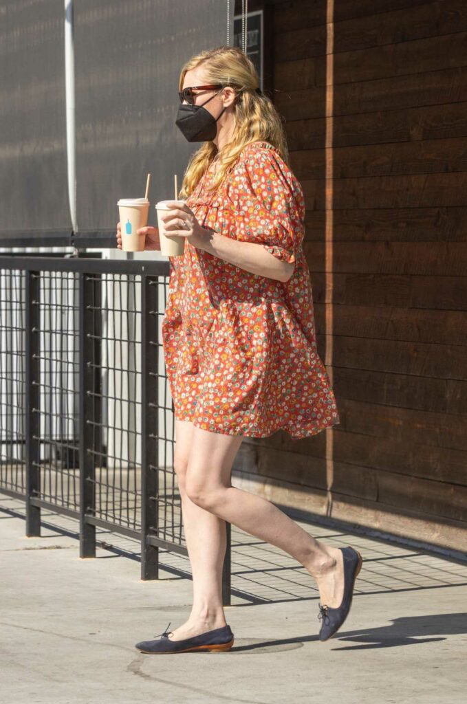 Kristen Dunst in a Red Floral Dress