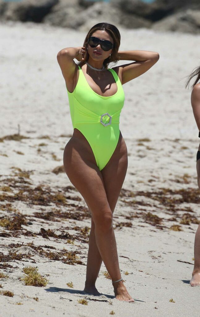Larsa Pippen in a Neon Yellow Swimsuit