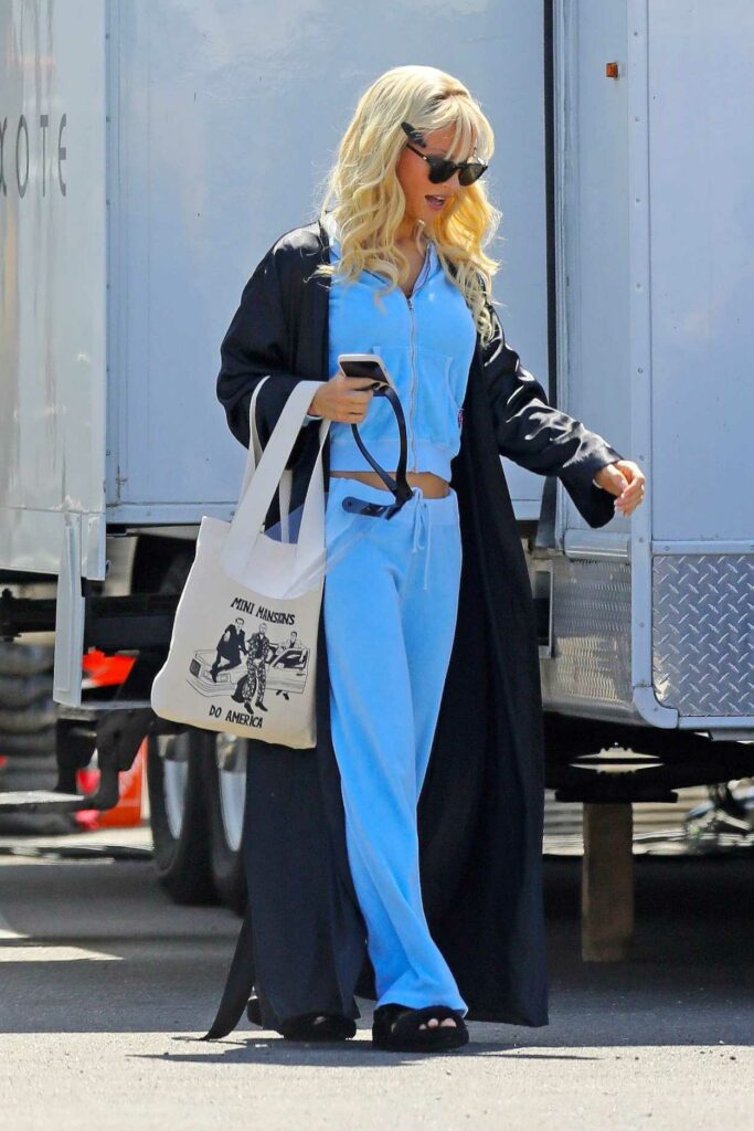 Lily James in a Blue Sweatsuit