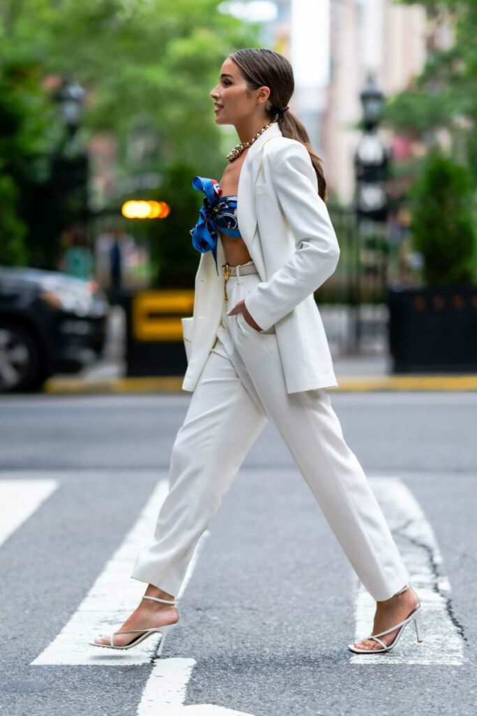 Olivia Culpo in a White Pantsuit