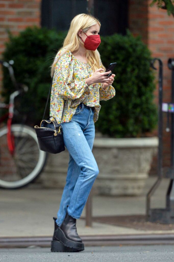 Emma Roberts in a Floral Blouse