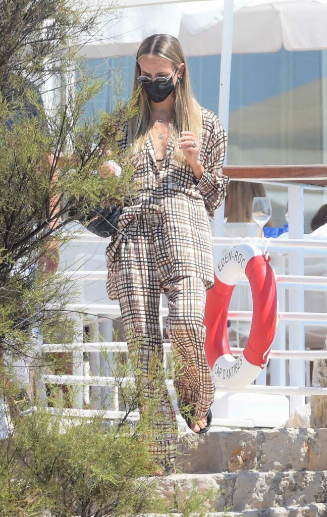 Natasha Poly in a Plaid Suit