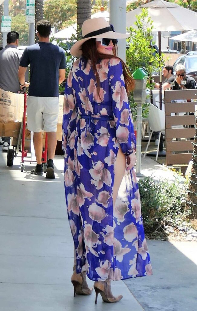 Phoebe Price in a Floral Dress