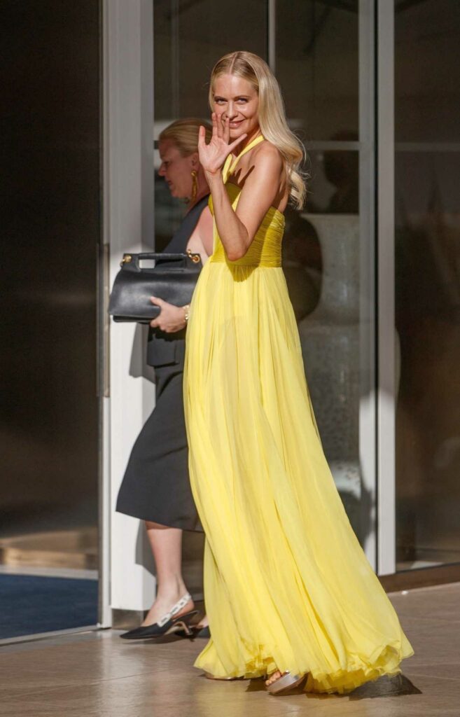 Poppy Delevingne in a Yellow Dress