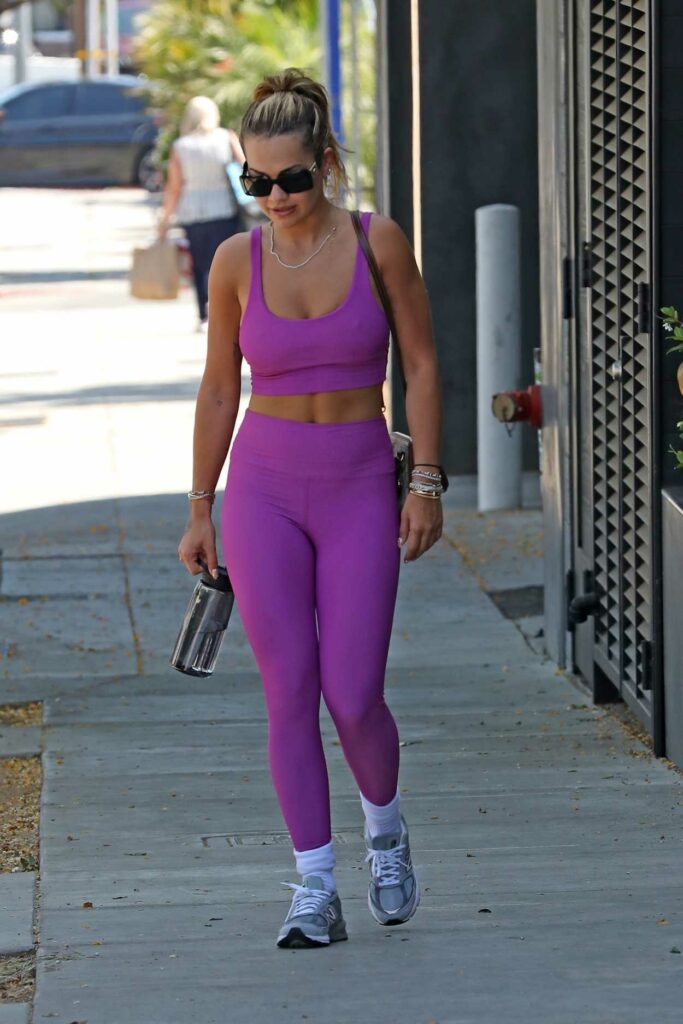Rita Ora in a Purple Workout Ensemble