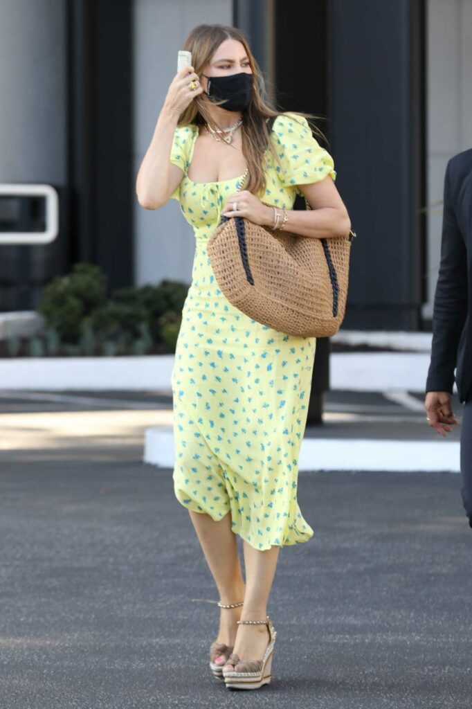 Sofia Vergara in a Yellow Patterned Dress