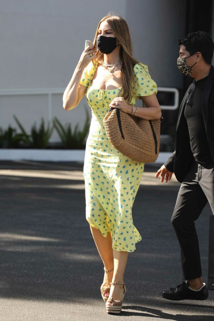 Sofia Vergara in a Yellow Patterned Dress