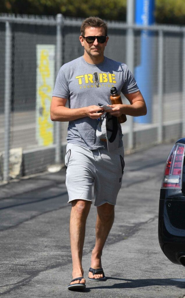 Bradley Cooper in a Grey Tee Arrives at His Office in Santa Monica 08/10/2021