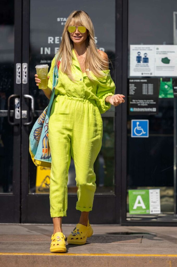 Heidi Klum in a Neon Green Jumpsuit