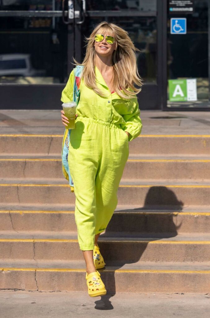 Heidi Klum in a Neon Green Jumpsuit