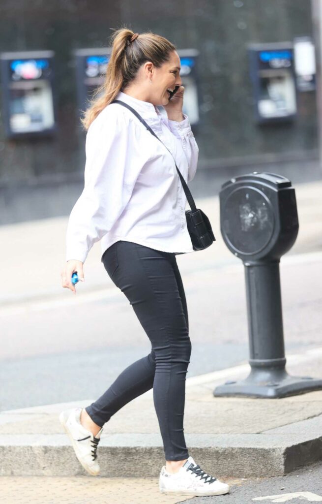 Kelly Brook in a White Sneakers