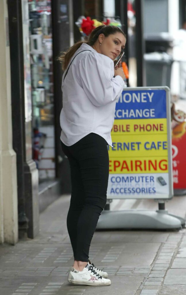 Kelly Brook in a White Sneakers