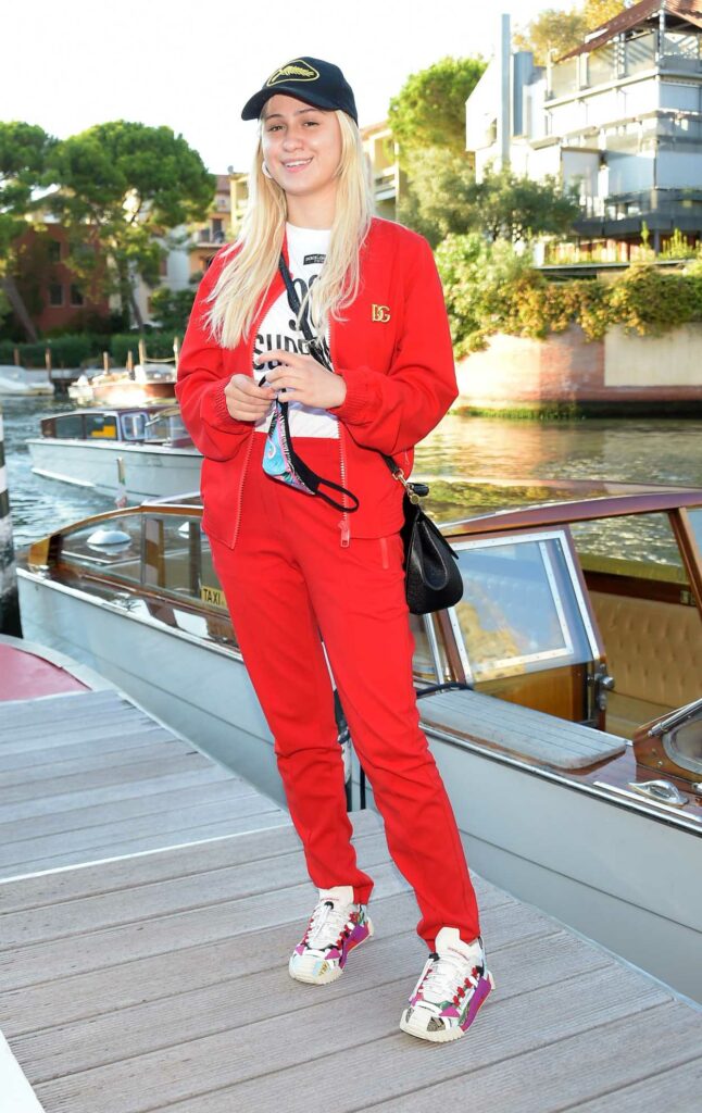 Maria Bakalova in a Red Tracksuit