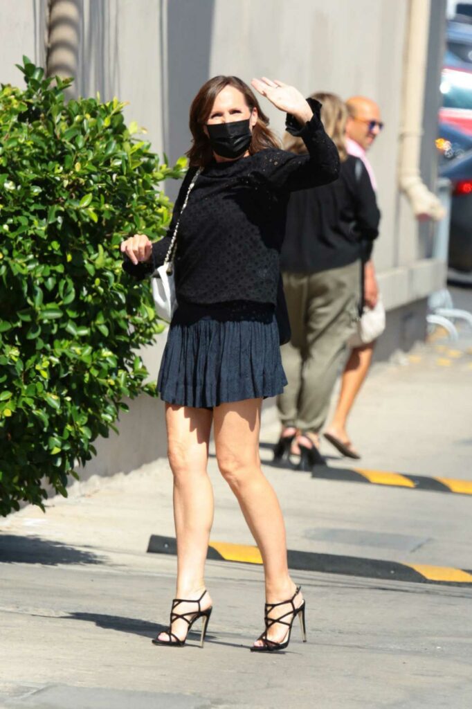 Molly Shannon in a Black Mini Skirt