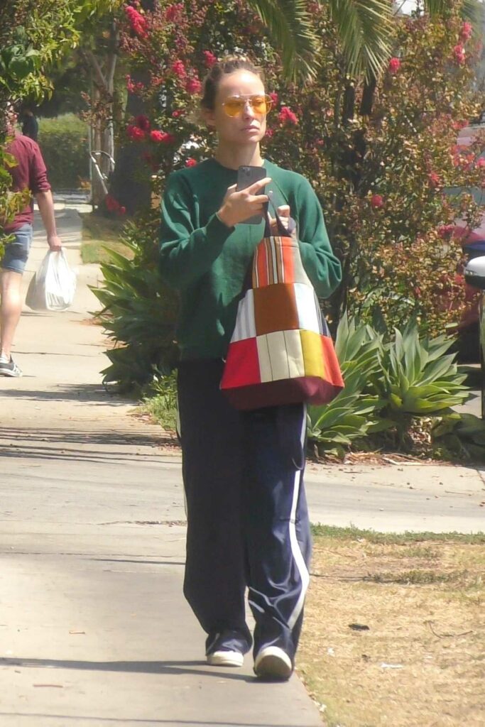 Olivia Wilde in a Green Sweatshirt